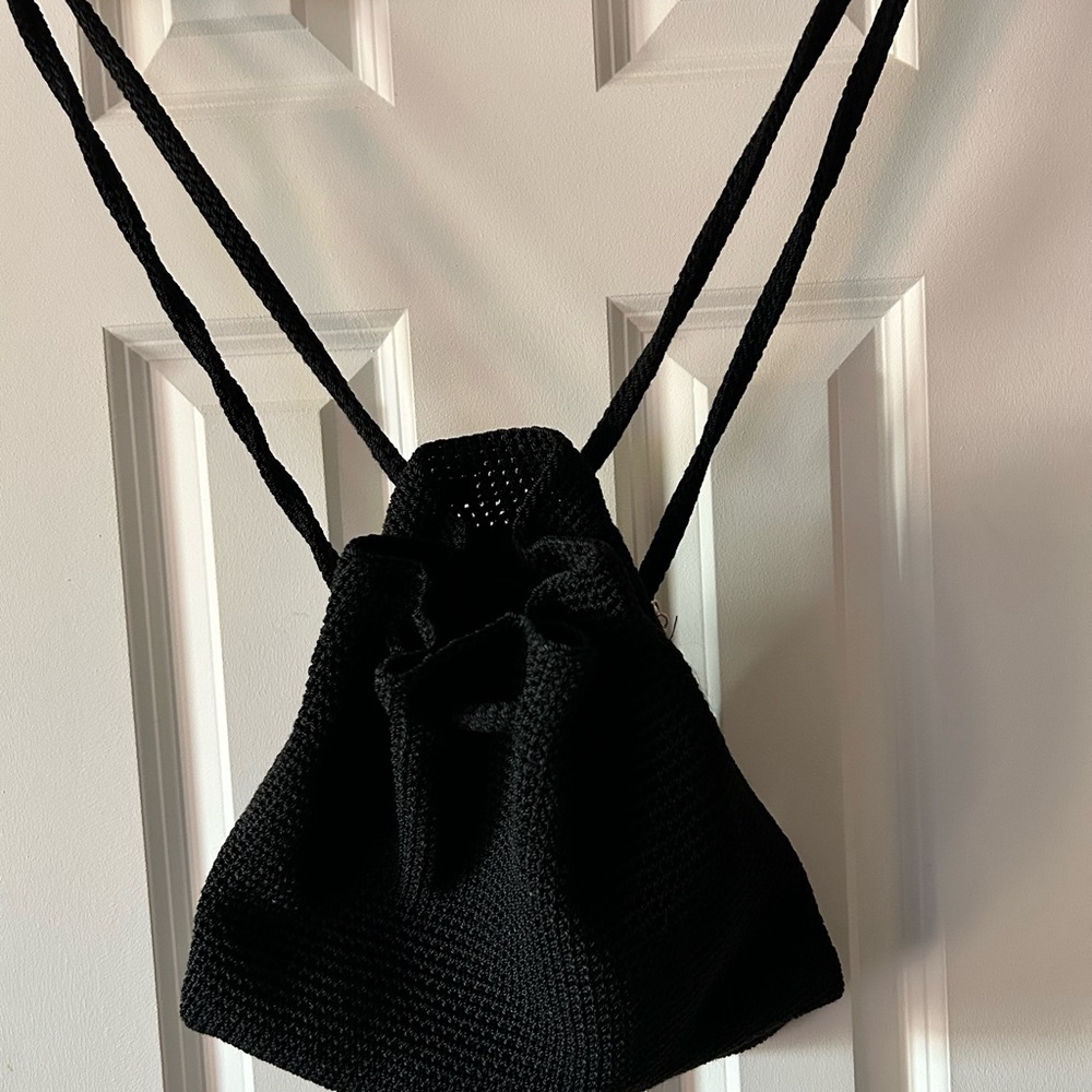 The Sak Black Crochet Drawstring Backpack